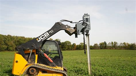 skid steer vibrating steel post driver|best skid steer post pounder.